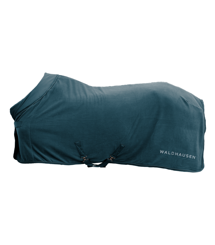 WALDHAUSEN NEPAL Fleecedecke - petrolblau Nepal Fleecedecke in Petrolblau mit Kreuzbegurtung und Waldhausen-Logo. Seitenansicht der weichen Pferdedecke.