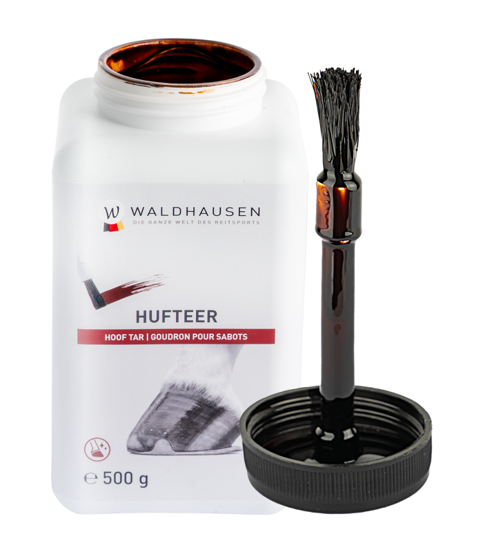 WALDHAUSEN Hufteer WALDHAUSEN Hufteer in der geöffneten weißen 500g Dose. Der schwarze Deckel mit integriertem Pinsel steht daneben.
