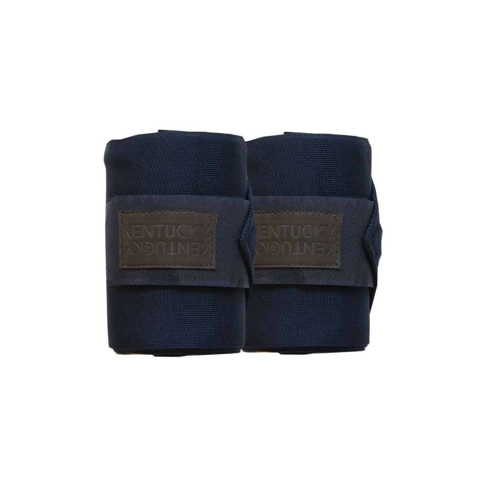 Frontansicht der aufgerollten Kentucky Horsewear Arbeits-Bandagen im 2er-Set in Marineblau mit braunem Logo-Patch.