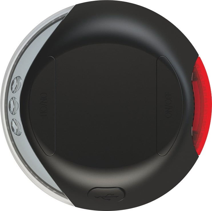 Rundes, schwarzes Kerbl flexi LED Lighting System für Hunde mit weißem Frontlicht, rotem Rücklicht und USB-Anschluss.